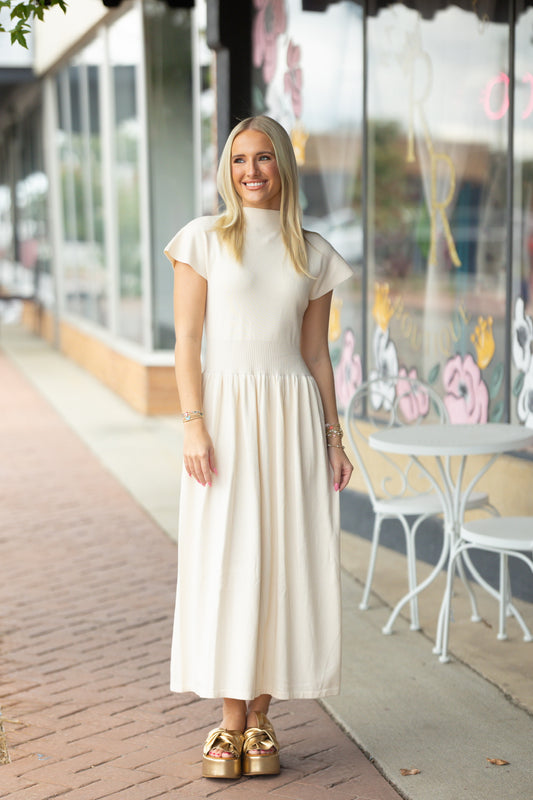 mock neck cream dress