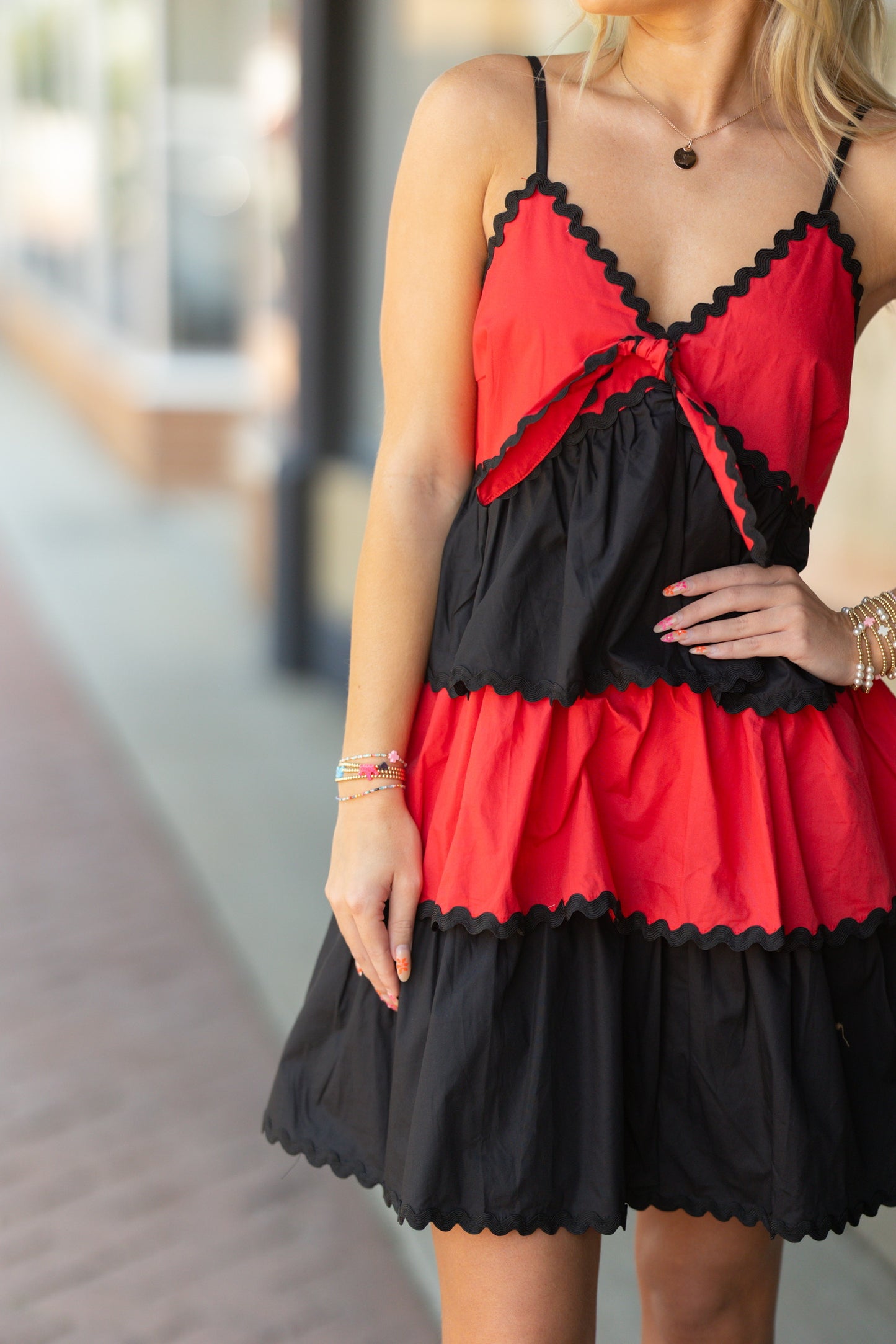 red and black trimmed dress