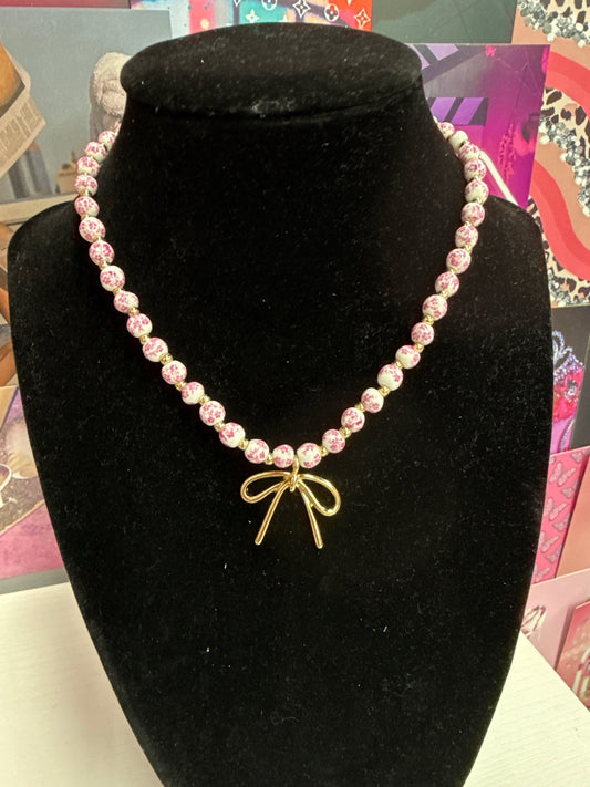 Pink and white bow necklace ￼