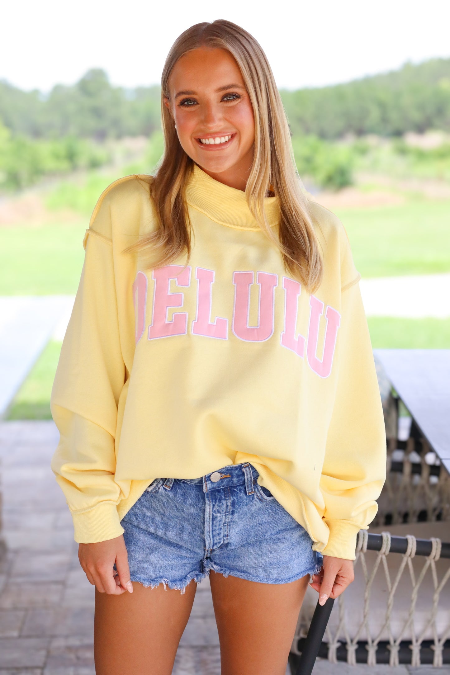 Delulu Embroidered Mock Neck